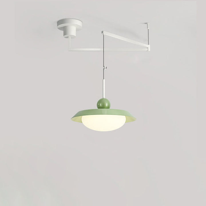 Modern pendant light made of acrylic and glass in a minimalist style