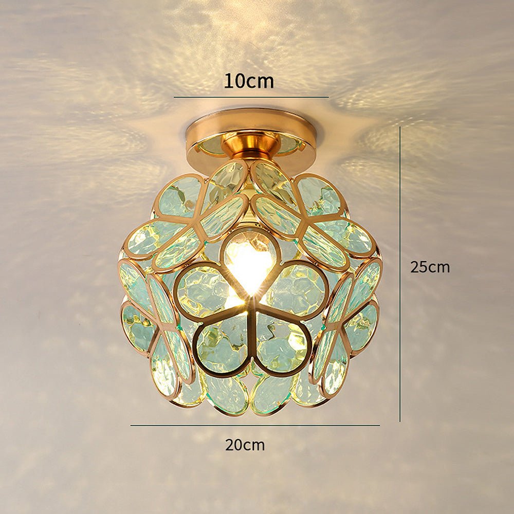 Floral glass ceiling light with light reflection