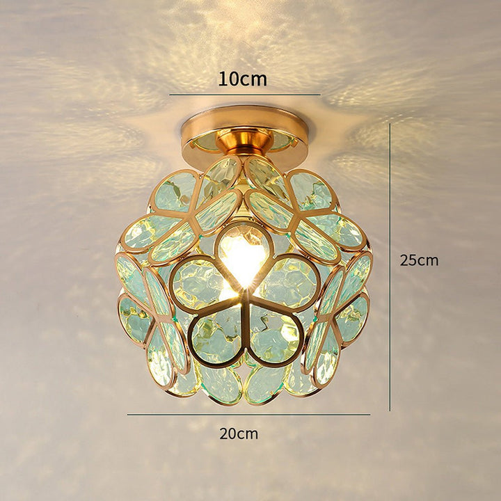 Floral glass ceiling light with light reflection