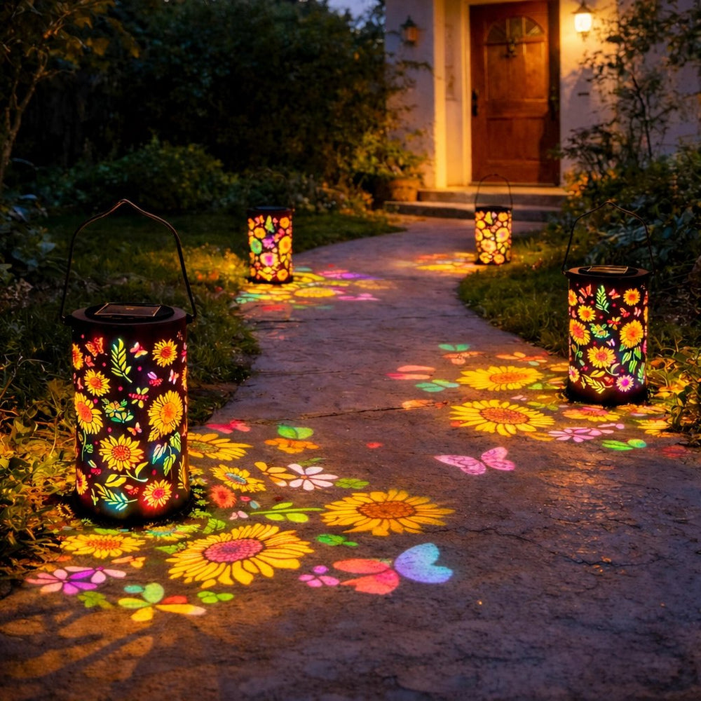 Metallene Solar Gartenlaterne mit floralem Muster bei eingeschaltetem Licht