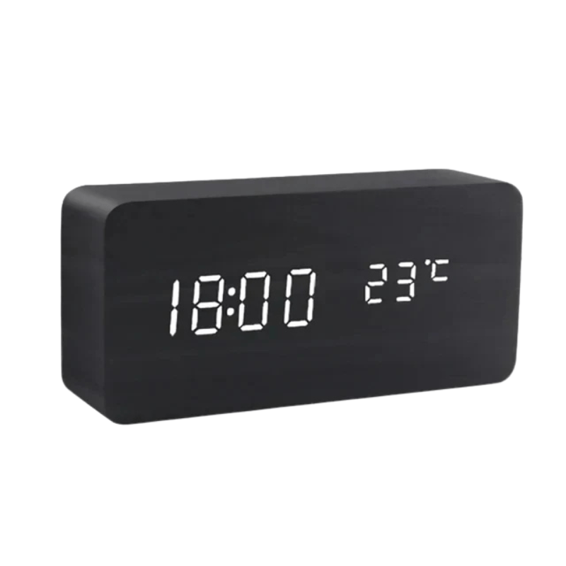 LED-Wecker mit Anzeige der Uhrzeit und Raumtemperatur auf einem Tisch