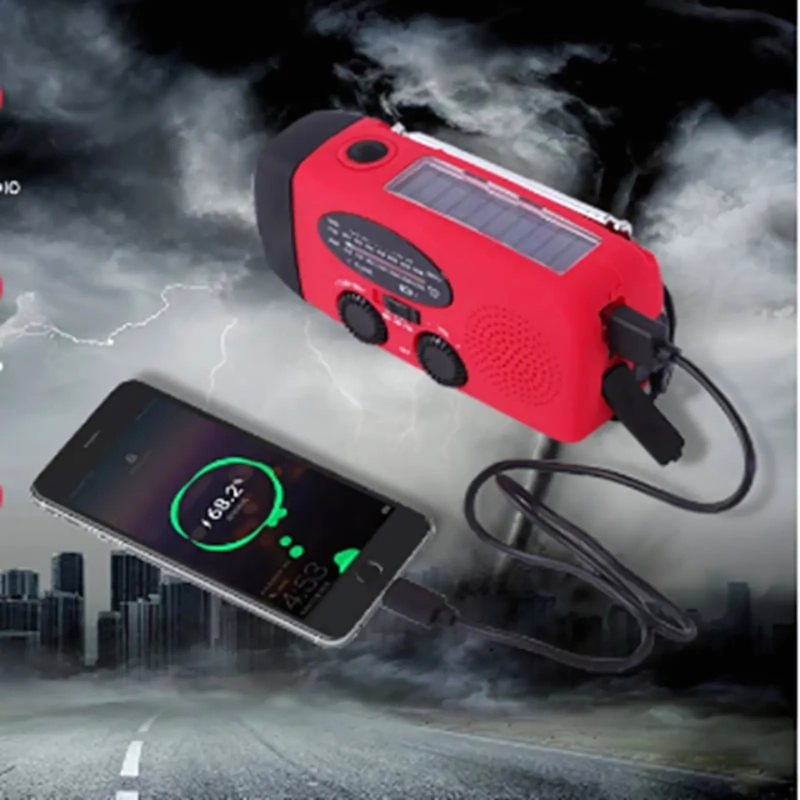 Multifunctional emergency radio with power bank – solar, USB, hand crank and LED flashlight for emergencies
