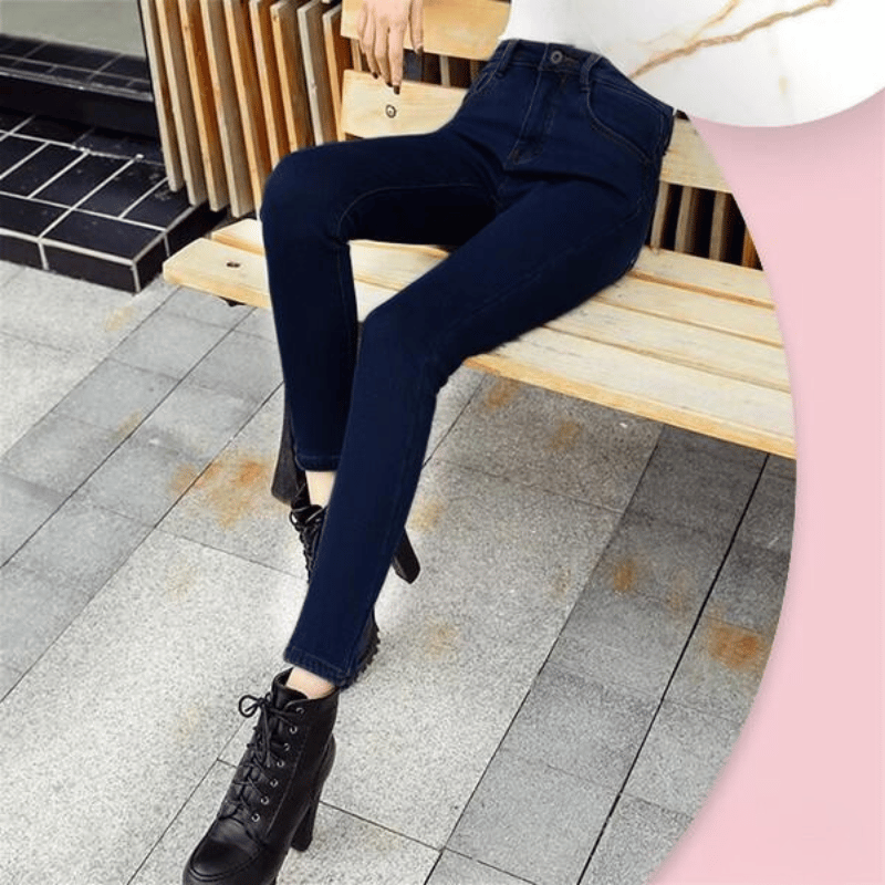 Women's winter jeans with high waist and warm lining