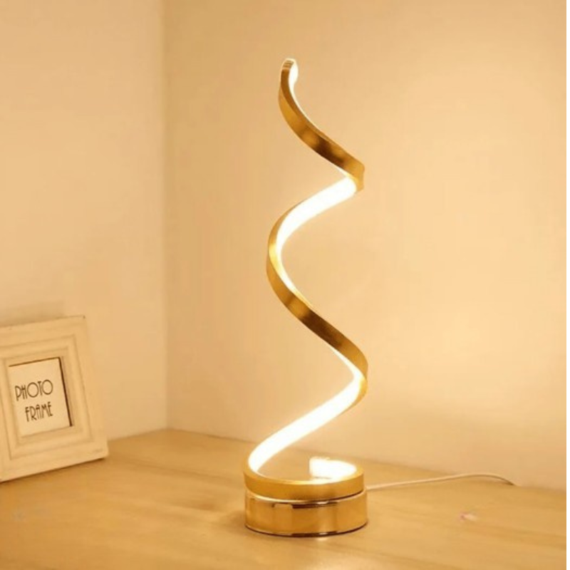 Spiral table lamp with warm light for modern living spaces