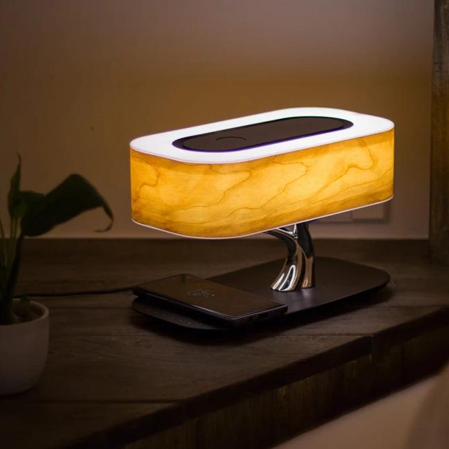 Designer LED table lamp with wood look, Bluetooth speaker and wireless charging function