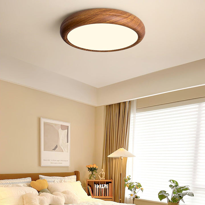 Round ceiling light with wood look and acrylic