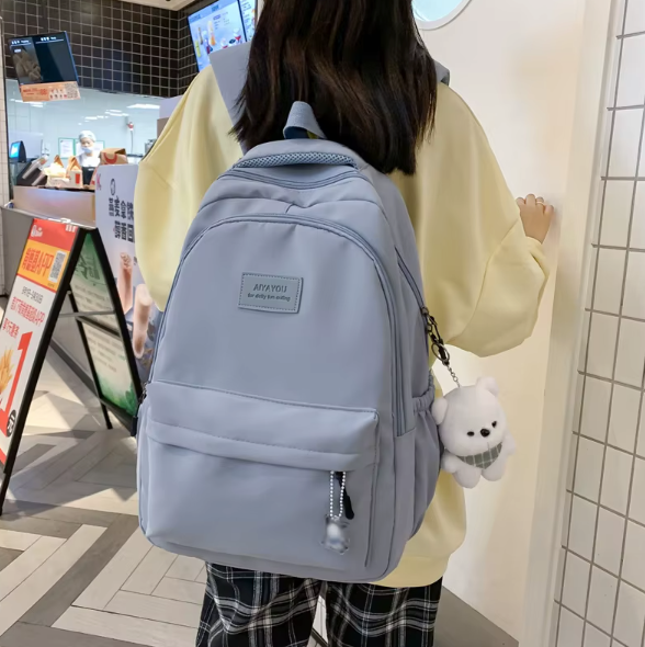 Waterproof school backpack with many compartments