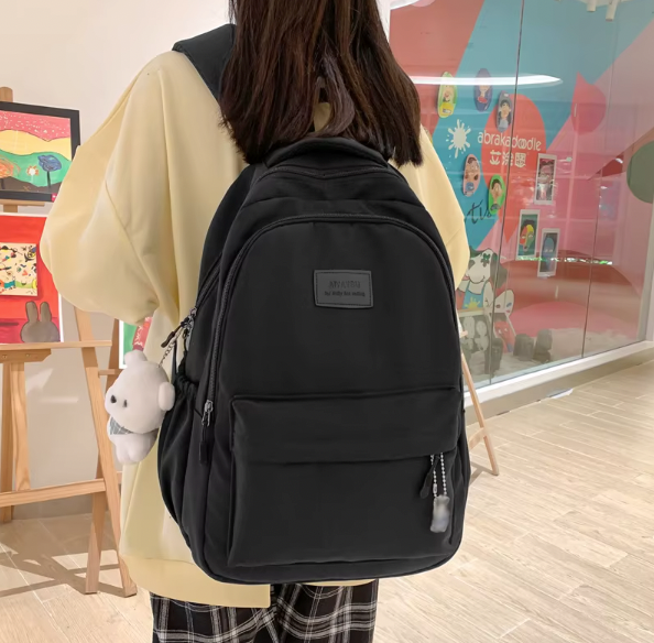 Waterproof school backpack with many compartments