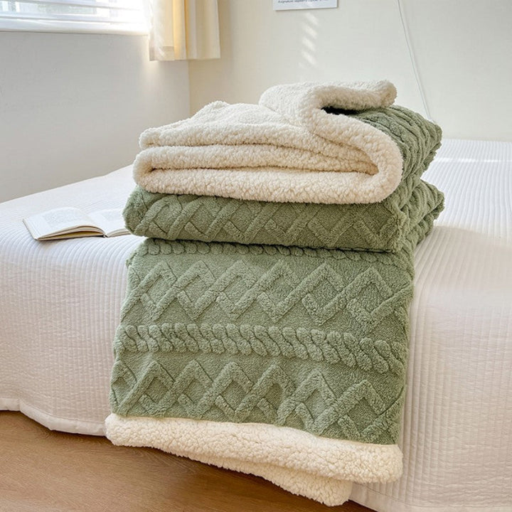 Soft, cuddly blanket with a double-sided design