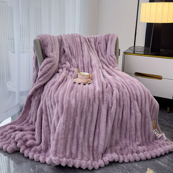 Sofa blanket with plush look