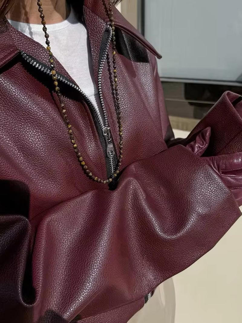 Women's faux leather jacket in burgundy with a modern cut
