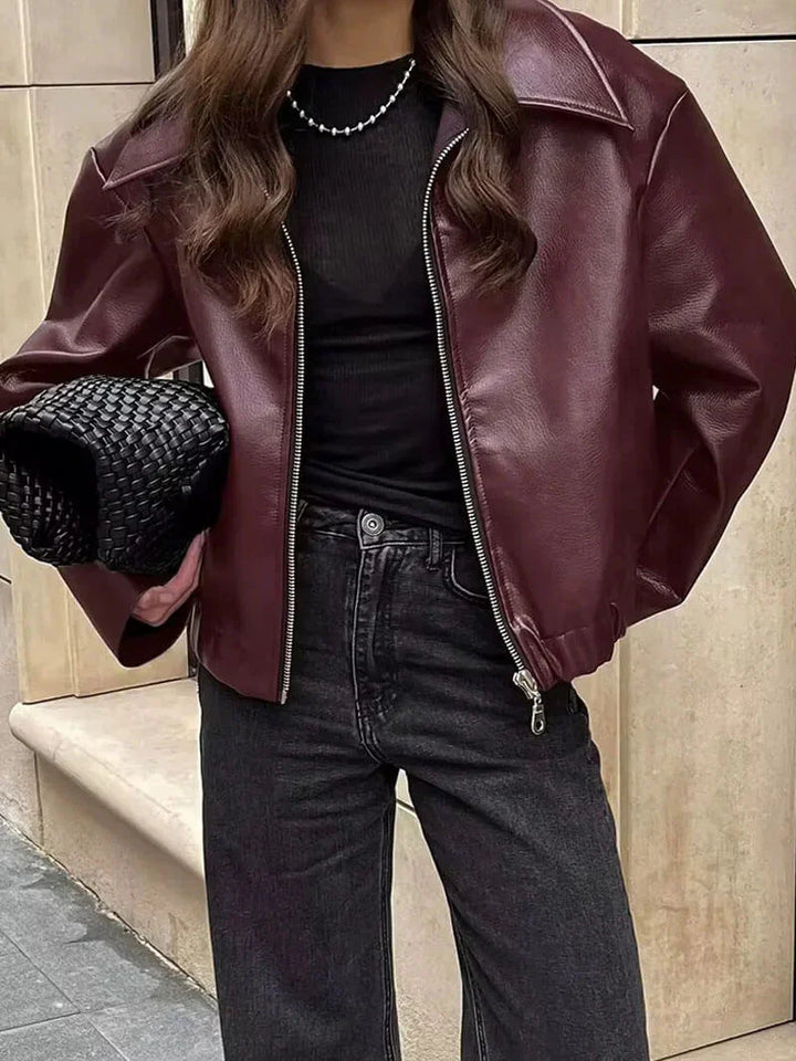Women's faux leather jacket in burgundy with a modern cut