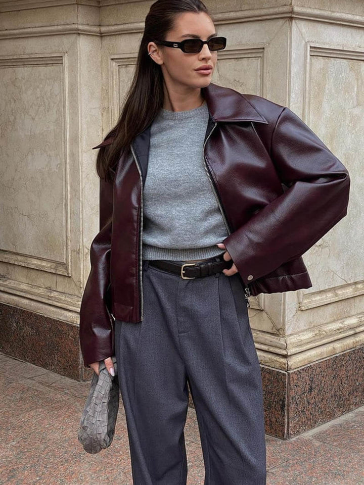 Women's faux leather jacket in burgundy with a modern cut