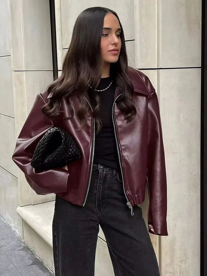 Women's faux leather jacket in burgundy with a modern cut