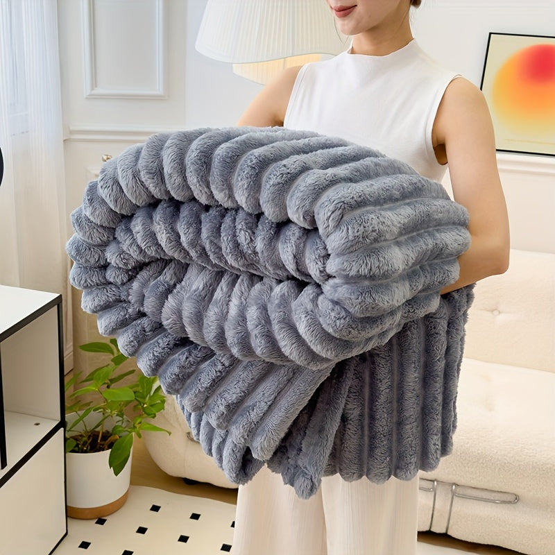 Sofa blanket with plush look