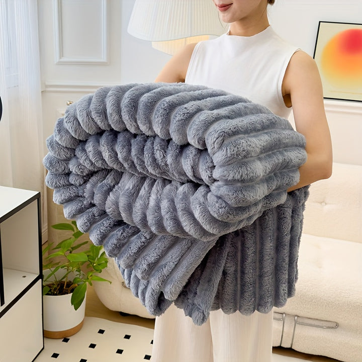 Sofa blanket with plush look