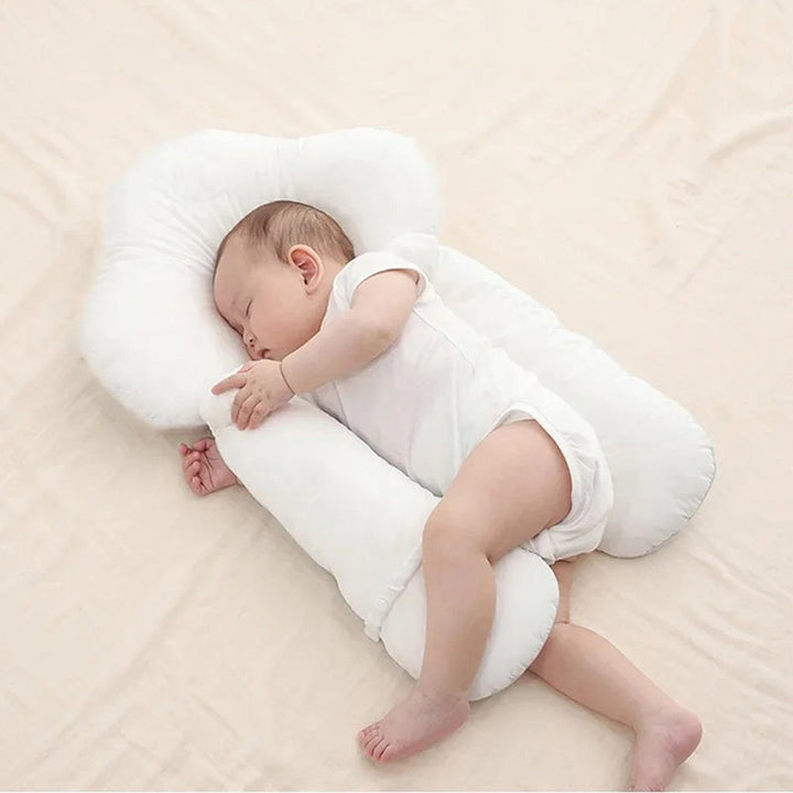 Ergonomic baby sleeping pillow with adjustable support