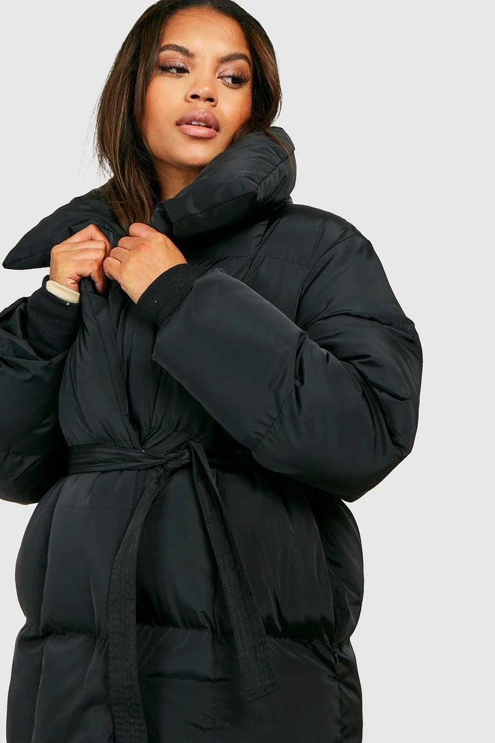 Women's quilted jacket with belt and stand-up collar 