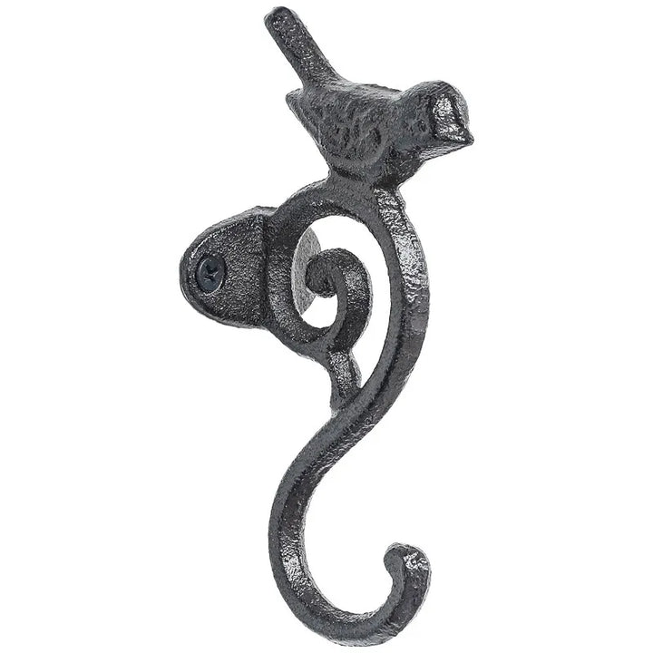 Wandhaken aus Gusseisen mit Vogel-Motiv im Vintage-Look an weißem Hintergrund