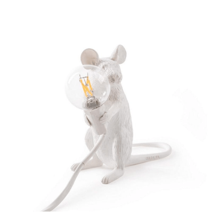 Decorative table lamp in mouse design