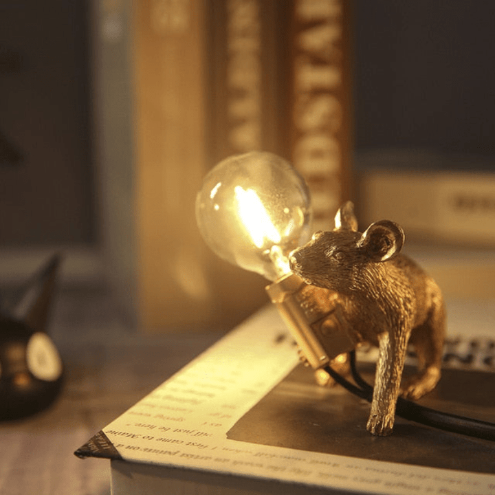 Decorative table lamp in mouse design