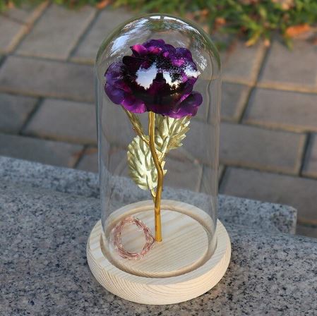 Glass bell with eternal rose and LED lights