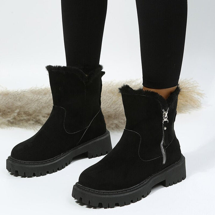 Women's ankle boots with zipper and profiled sole