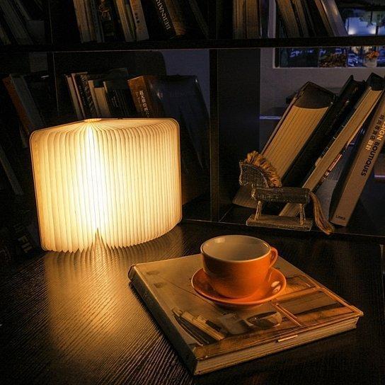 Foldable LED book lamp with wood look and rechargeable battery