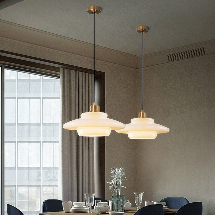 Mid-century style pendant lamp made of frosted glass with brass detail