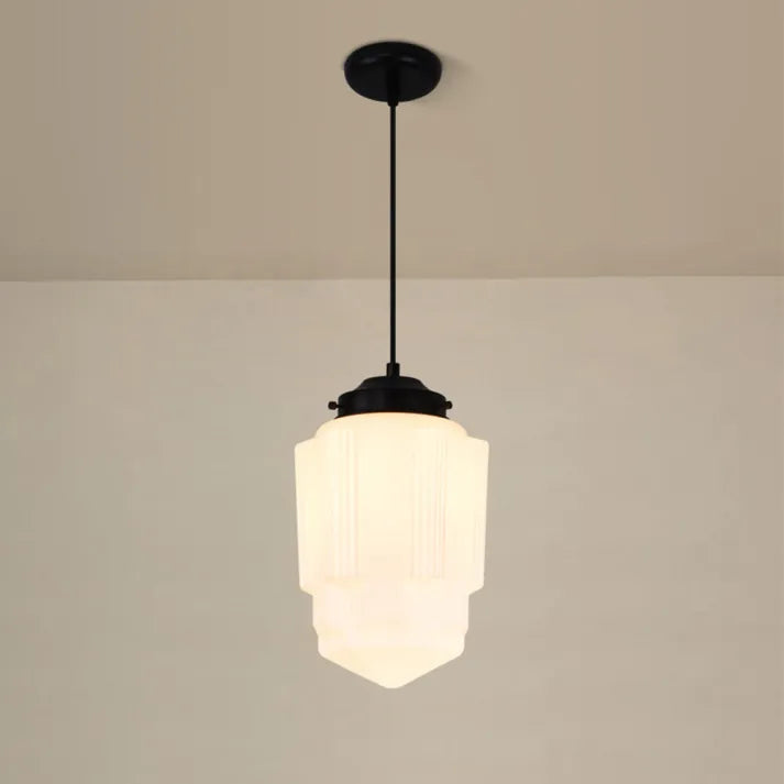 Pendant lamp made of white frosted glass in a geometric design