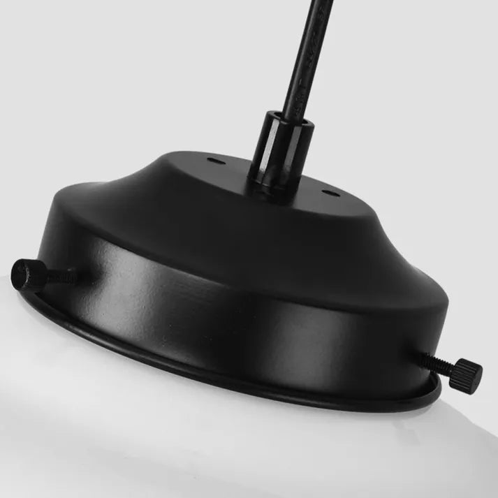 Pendant lamp made of white frosted glass in a geometric design