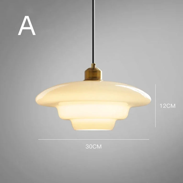 Mid-century style pendant lamp made of frosted glass with brass detail