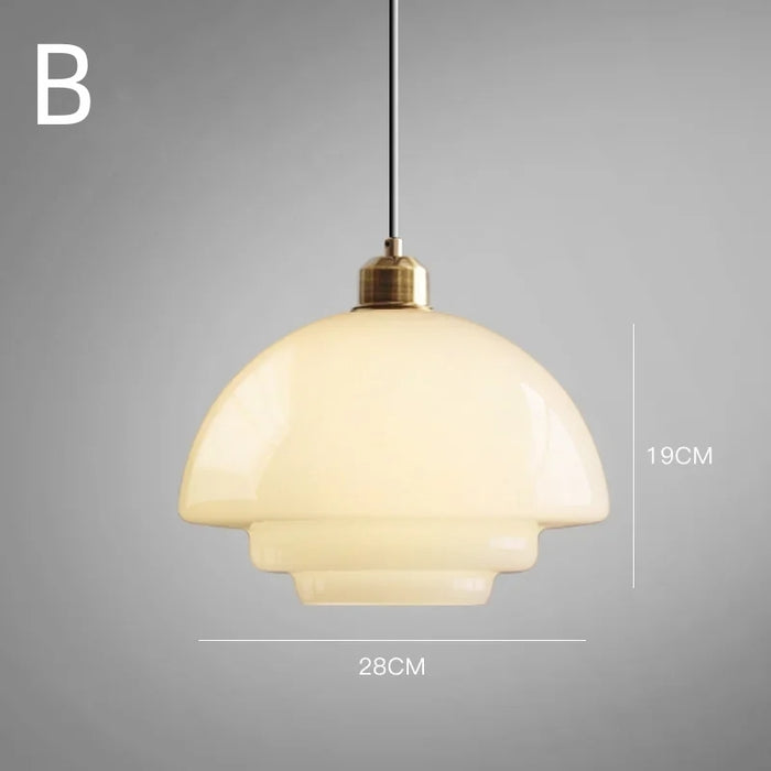 Mid-century style pendant lamp made of frosted glass with brass detail