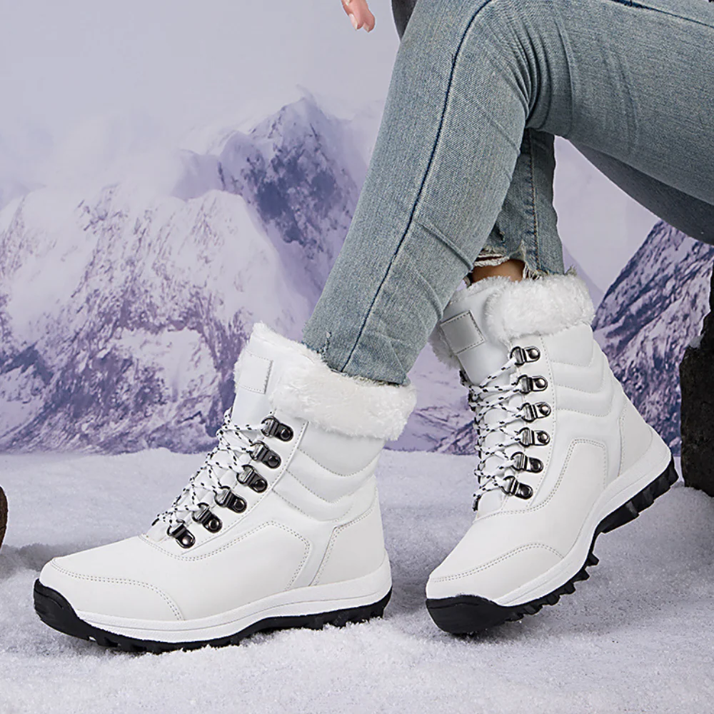 Women's boots with quilted design and lacing at calf height