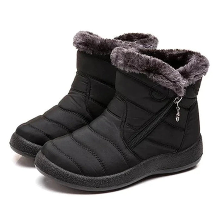Women's ankle boots with quilted design and zipper