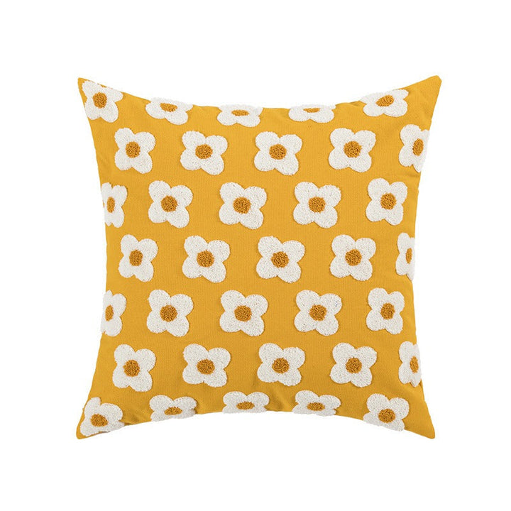 Jacquard-Kissenbezug mit Stickerei dekorativ auf Sofa arrangiert
