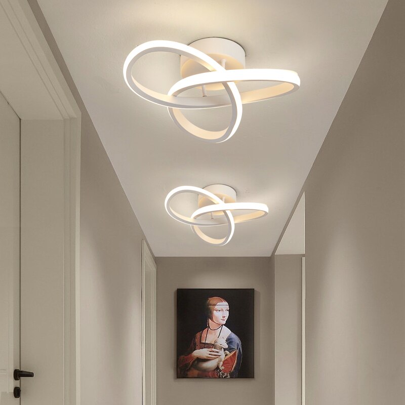 Modern LED ceiling light with three rings in a sculptural design