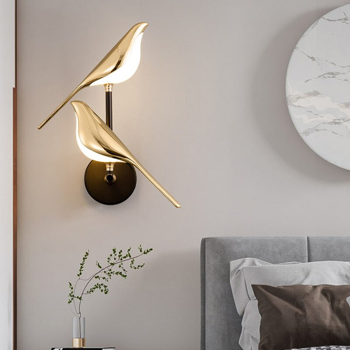 Playful modern LED wall light with bird motif for living room