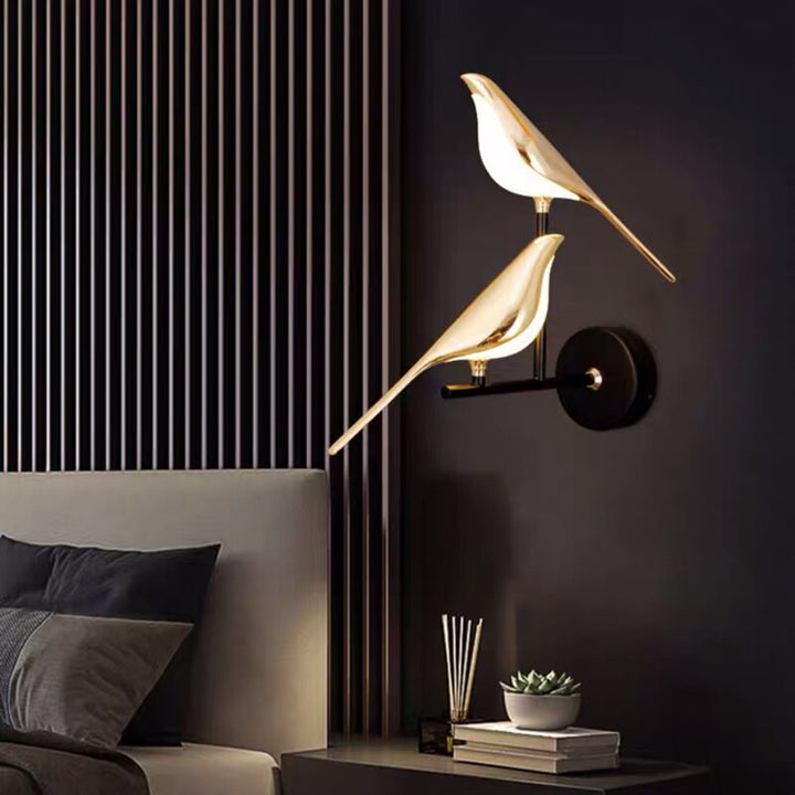 Playful modern LED wall light with bird motif for living room