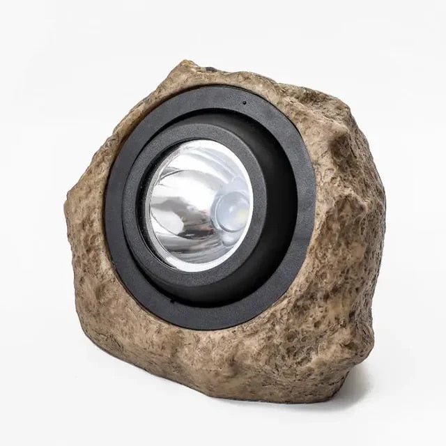 Solar-powered LED outdoor lamp with stone look for garden