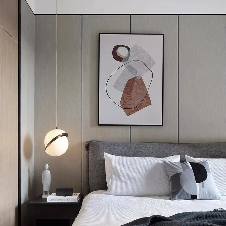 Spherical ceiling light with gold finish for stylish living spaces