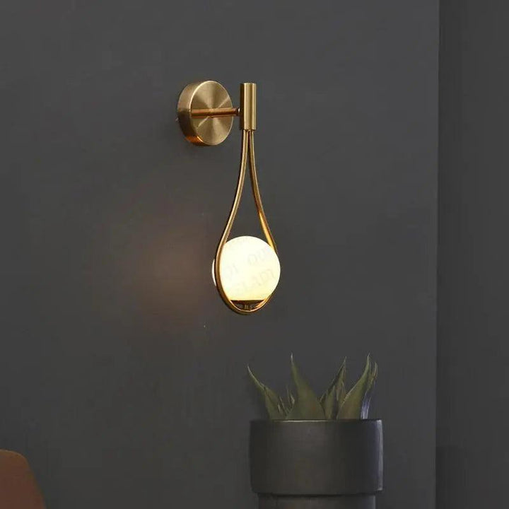 Spherical wall light with warm light for stylish interiors