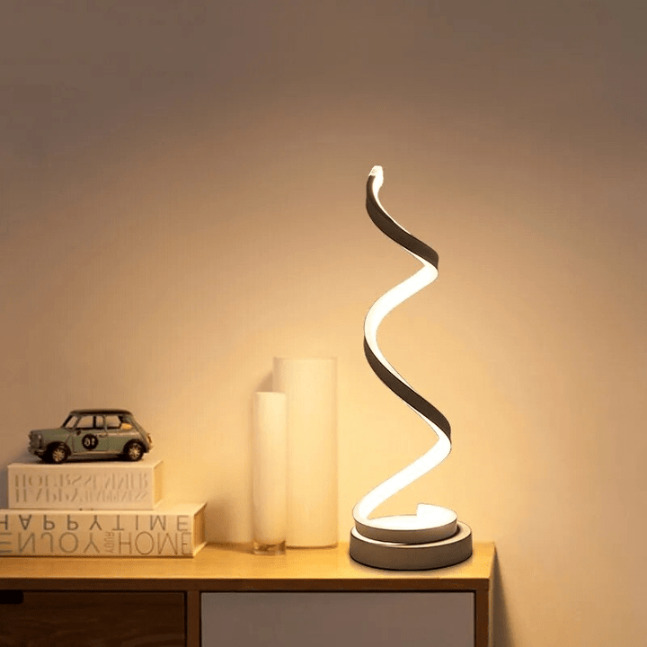Spiral table lamp with warm light for modern living spaces