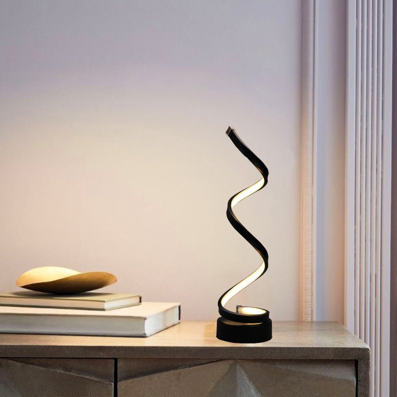 Spiral table lamp with warm light for modern living spaces