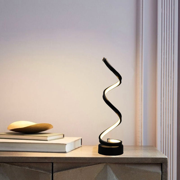 Spiral table lamp with warm light for modern living spaces