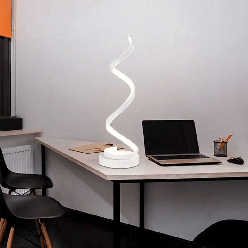 Spiral table lamp with warm light for modern living spaces