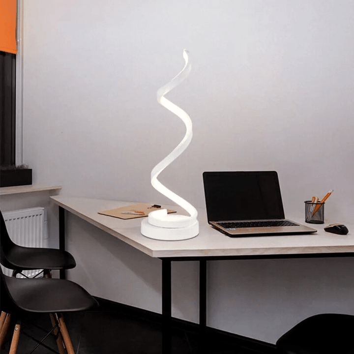 Spiral table lamp with warm light for modern living spaces