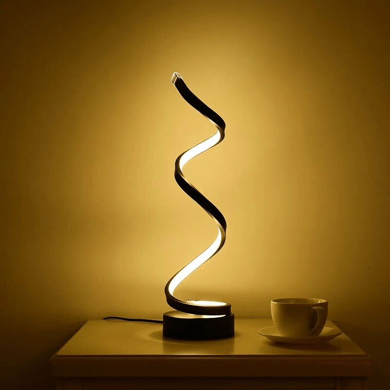 Spiral table lamp with warm light for modern living spaces