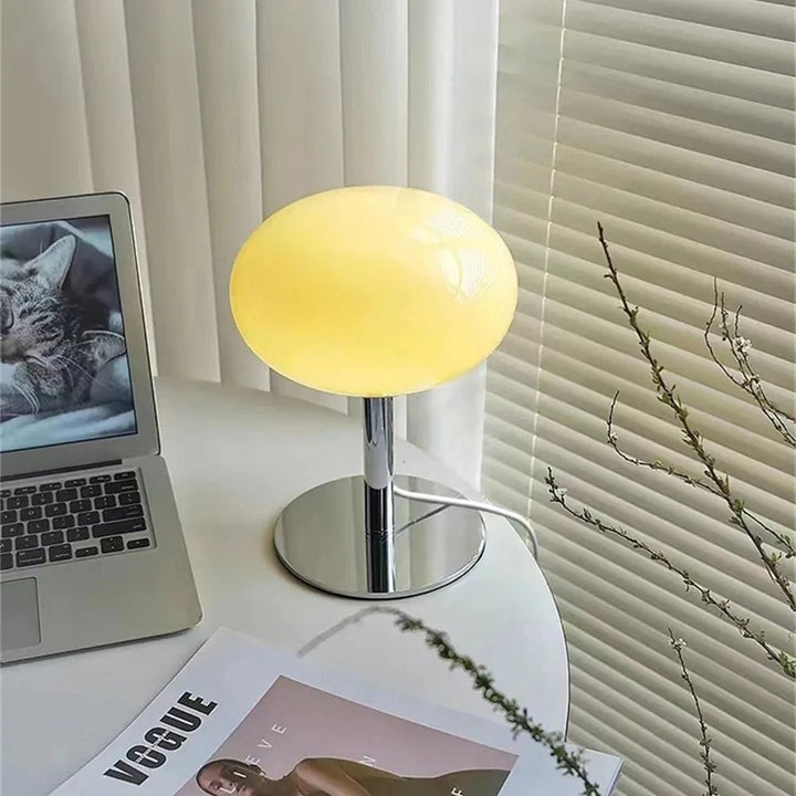 Playful table lamp in a macaron design with warm light for stylish rooms