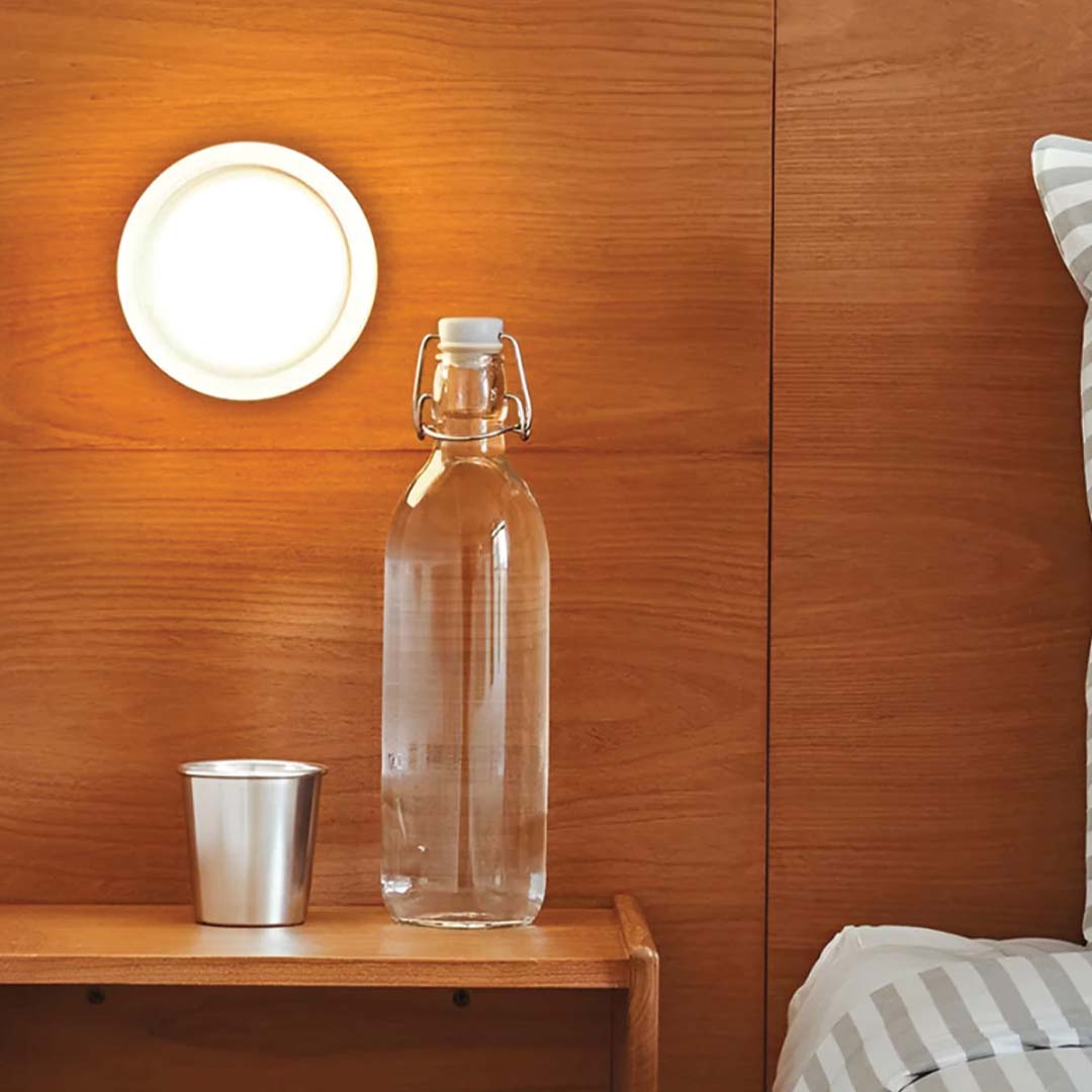 Modern circular wall light with atmospheric light for living spaces